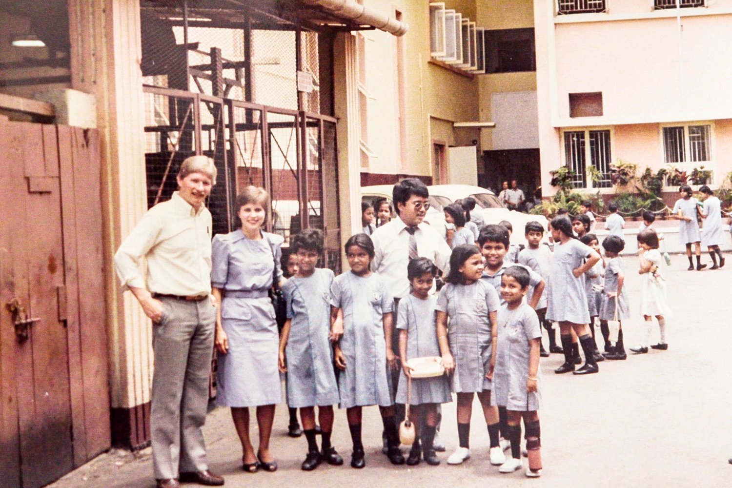 Hal and Doree Donaldson, left, with Convoy's Solomon Wang and children at an orphanage in India.